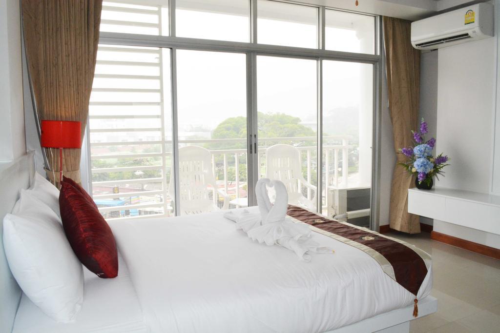 Angelina Guesthouse Patong Habitación foto