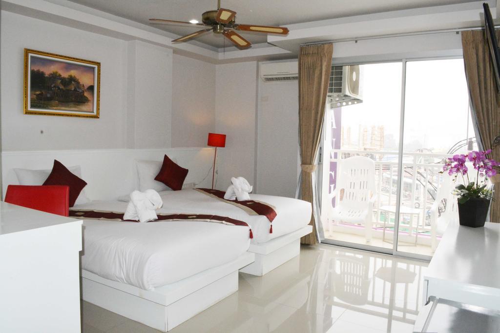 Angelina Guesthouse Patong Habitación foto