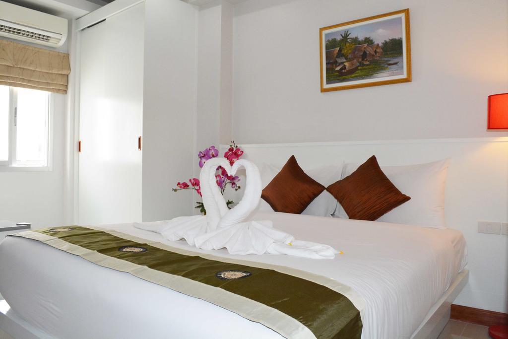 Angelina Guesthouse Patong Habitación foto