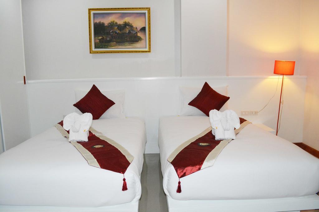 Angelina Guesthouse Patong Habitación foto