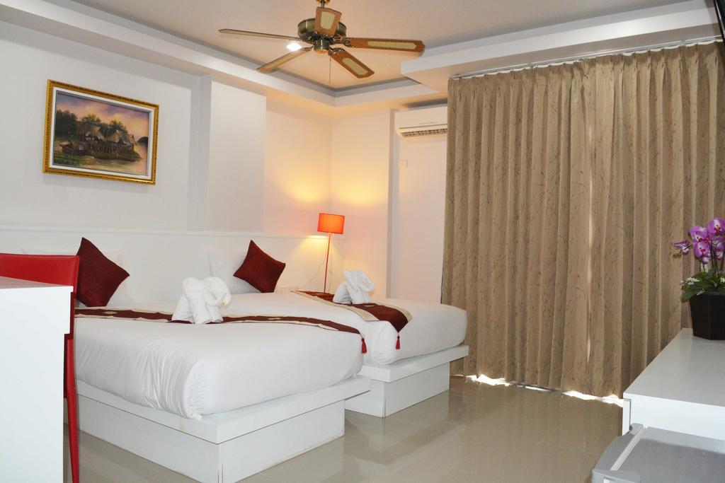 Angelina Guesthouse Patong Habitación foto