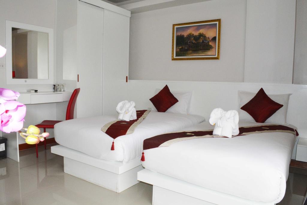 Angelina Guesthouse Patong Habitación foto