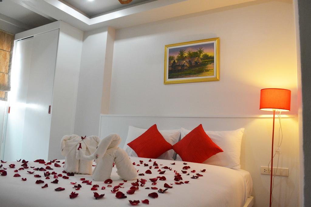 Angelina Guesthouse Patong Habitación foto