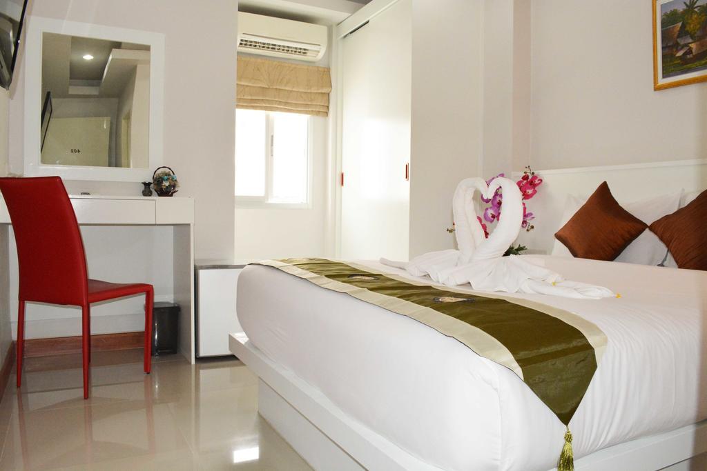 Angelina Guesthouse Patong Habitación foto