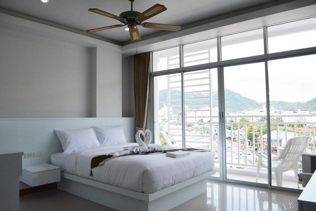 Angelina Guesthouse Patong Habitación foto
