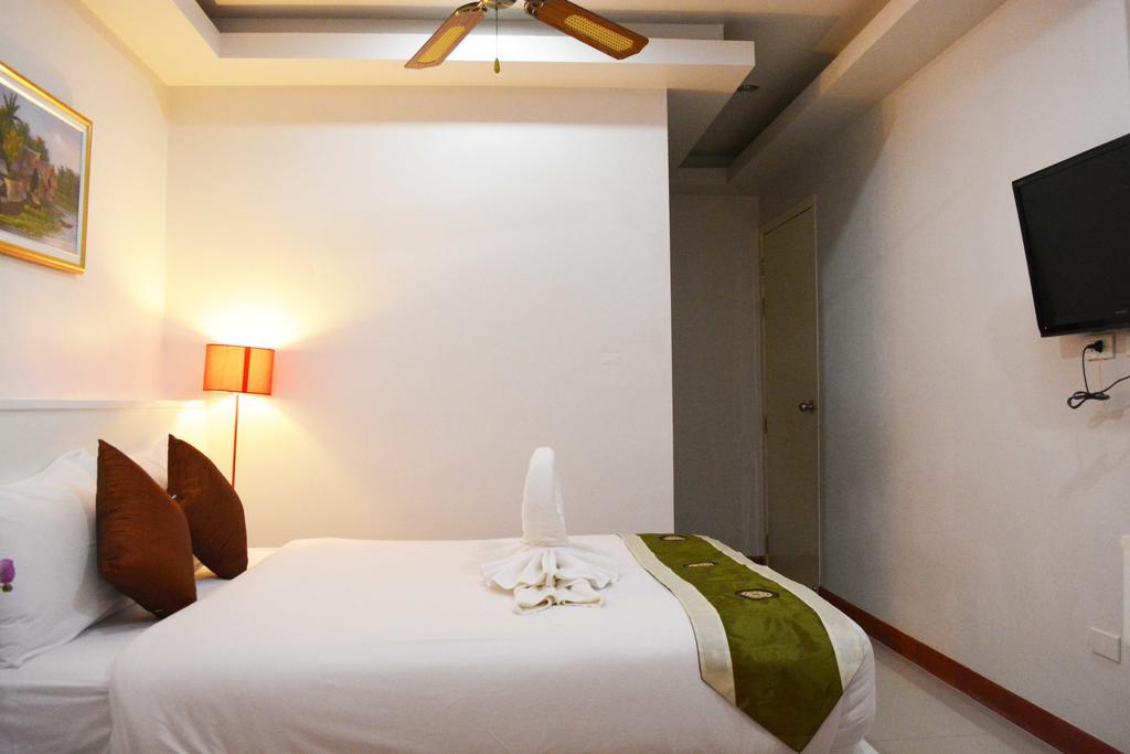 Angelina Guesthouse Patong Habitación foto