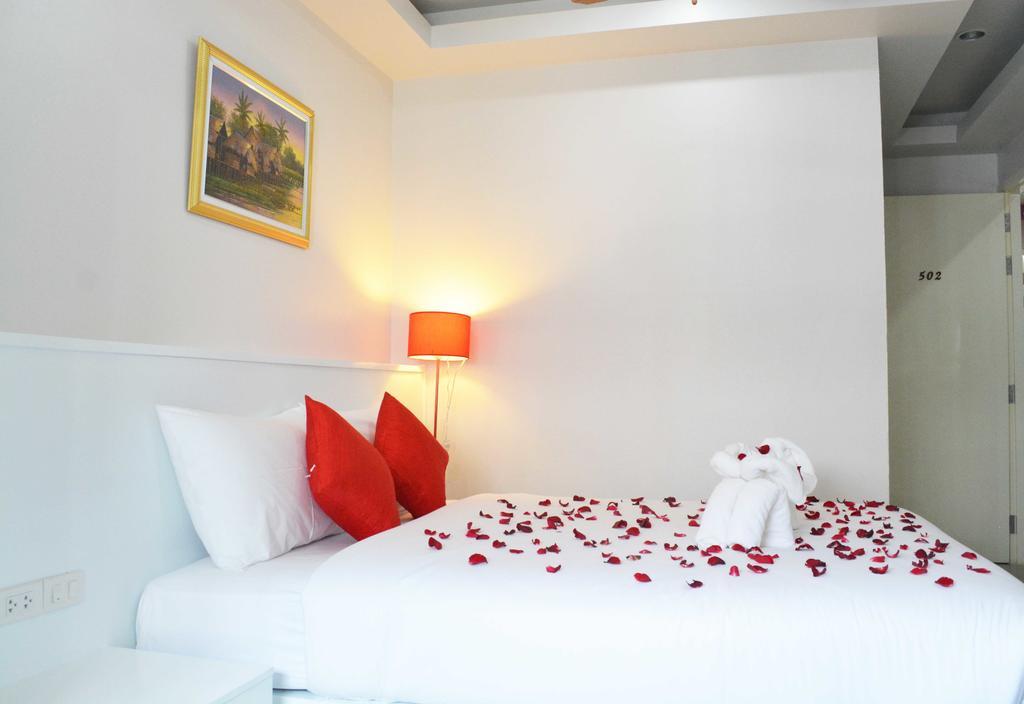 Angelina Guesthouse Patong Habitación foto